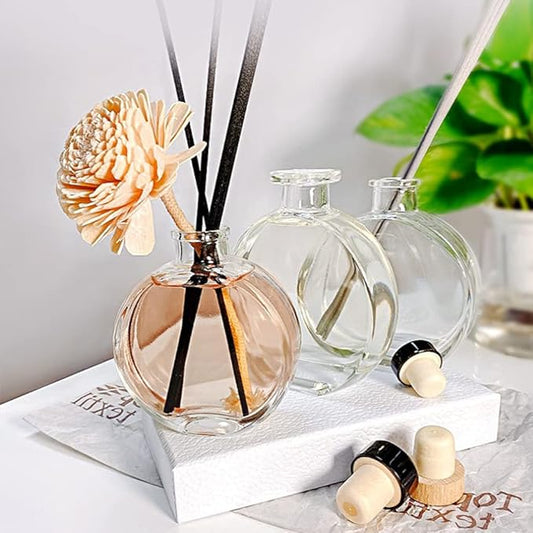 Botella con perfume para aromatizar ambientes en caja de regalo